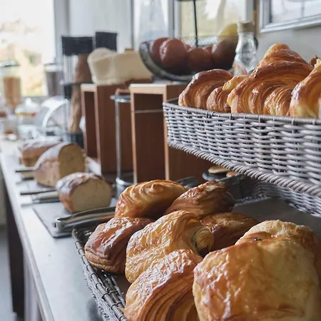 מלון Western Le Canard Sur Le Toit קולומייר